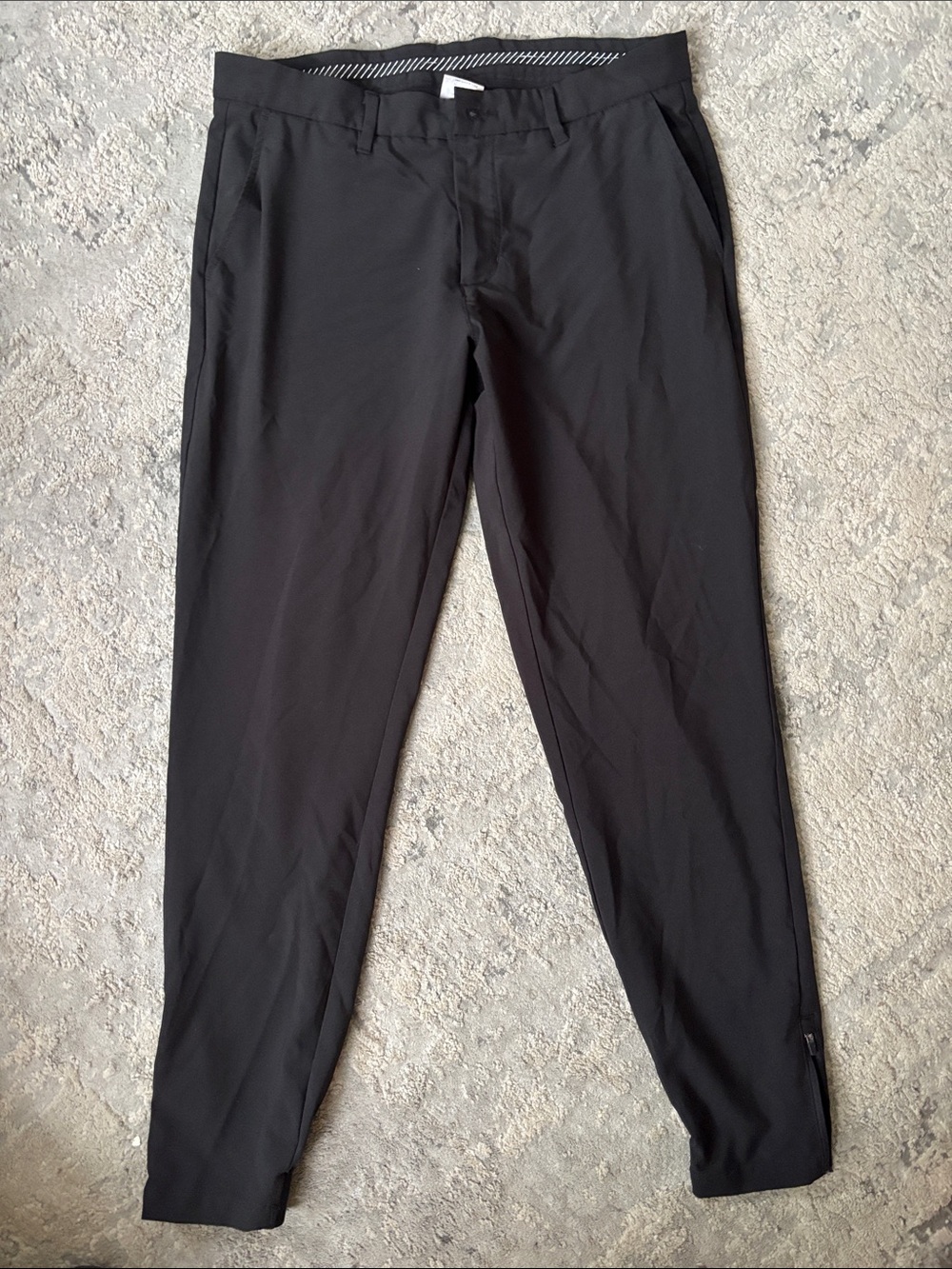 Primo golf joggers featuring performance stretch fabric and an ankle zipper